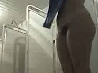 Swimming pool shower room, blonde milf caught naked by spy camera.